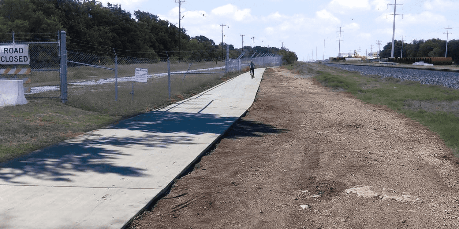 Photoshopped conceptualization of greenway trail running between Fort Sam Houston and Union Pacific track—Photo: SRR