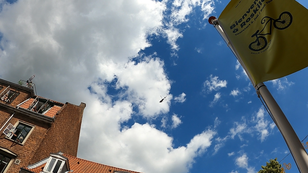 You may have to zoom your image to see the TV helicopter contrasting the clouds—Video: SRR