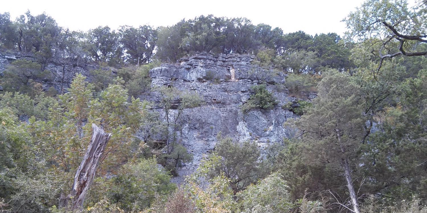 The 100-foot (30-m) bluffs of Medicine Wall overlooking Salado Creek