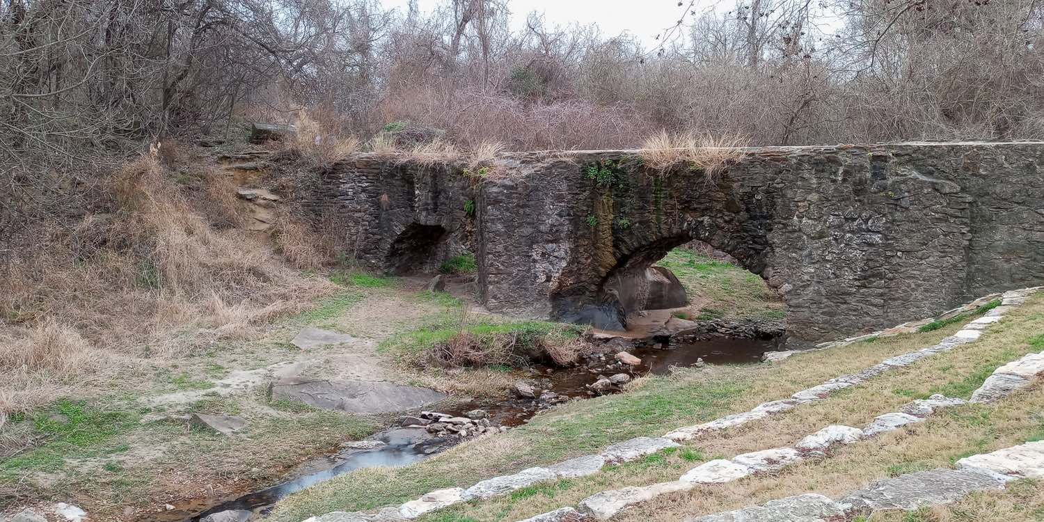 View of aqueduct stonework from creekside