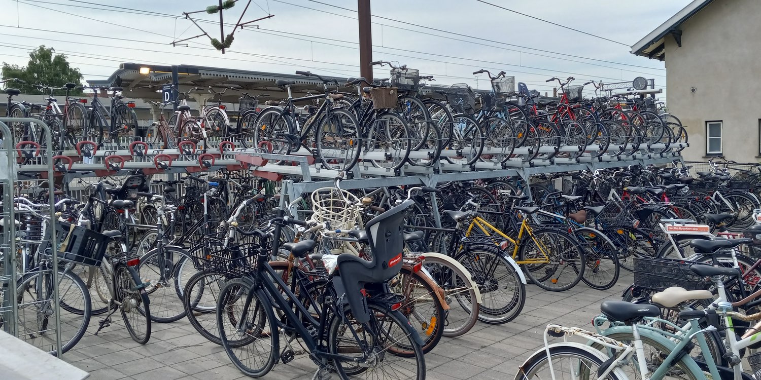 Bikes are placed on racks at the Kellerup train station, located north of Copenhagen—Photo: SRR